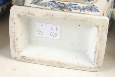 Lot 506 - A garniture of three Chinese porcelain blue...