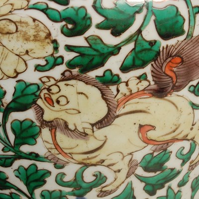 Lot 510 - A Chinese porcelain Wucai jar and wood cover,...