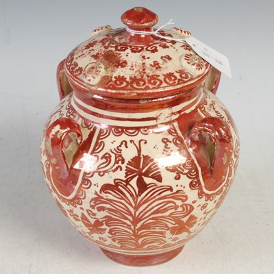 Lot 512 - A Hispano-Moresque pottery four handled jar...