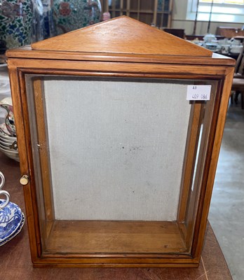Lot 515 - A blondewood and clear glass rectangular free...