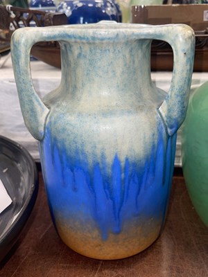 Lot 525 - A Ruskin pottery three handled vase, covered...