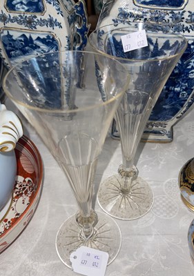 Lot 542 - A vintage pair of tall, clear faceted glass...