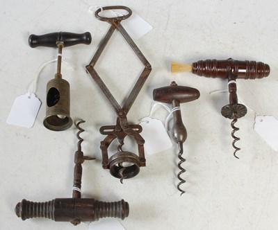 Lot 544 - A group of five assorted Antique corkscrews.