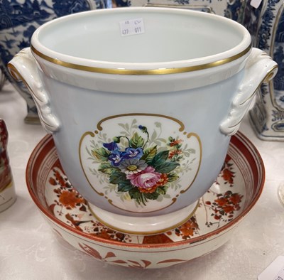 Lot 547 - A Portuguese pale blue ground twin handled...