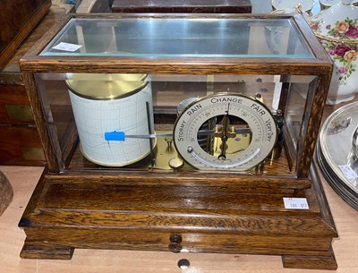 Lot 559 - An vintage oak cased barograph, 38cm wide.