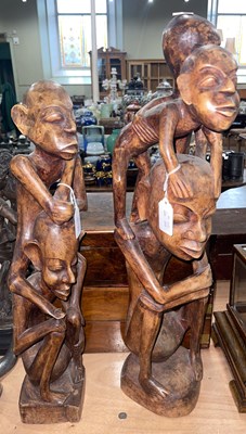 Lot 560 - Two African carved wood Tribal figures, 62cm...