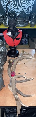 Lot 570 - A pair of antler horn candlestands; and a...