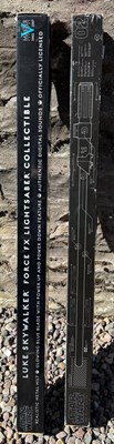 Lot 596 - Two Force FX Lightsabers comprising Darth...