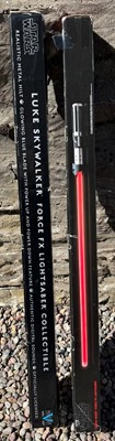 Lot 596 - Two Force FX Lightsabers comprising Darth...