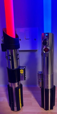 Lot 596 - Two Force FX Lightsabers comprising Darth...