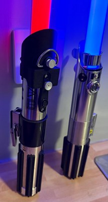 Lot 596 - Two Force FX Lightsabers comprising Darth...