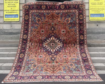 Lot 882 - A large Persian rug, Iranian, 20th century,...