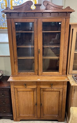 Lot 720 - A late 19th century blondewood two part...