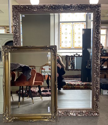 Lot 865 - A rectangular overmantle with bevelled mirror...