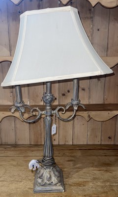 Lot 734 - A decorative painted metal table lamp and...