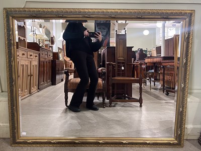 Lot 735 - Two gilt framed rectangular bevelled glass...