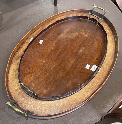 Lot 739 - Two Antique mahogany oval serving trays, both...