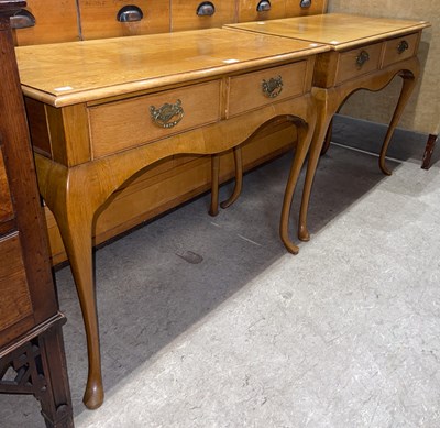 Lot 743 - A pair of blonde oak console/ side tables, the...