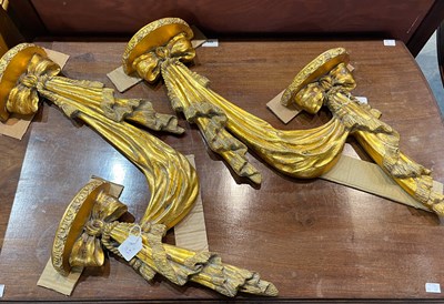 Lot 747 - A pair of composite gilt decorated two tier...