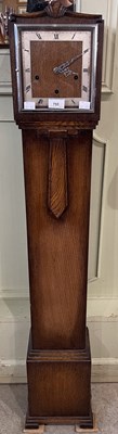 Lot 755 - An oak grandmother clock with square Roman...