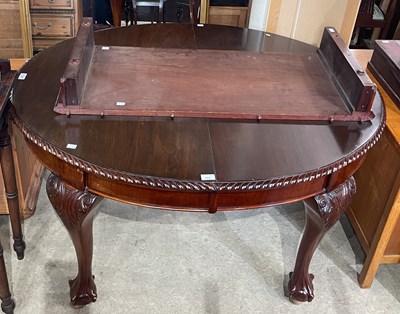 Lot 764 - A mahogany extending dining table, enclosing...