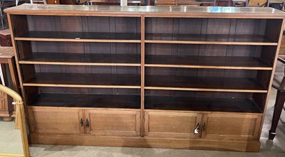 Lot 777 - An early 20th century oak open bookcase,...