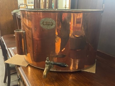 Lot 786 - A copper twin handled water urn/ dispenser,...