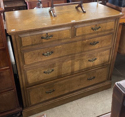 Lot 797 - A late 19th/ early 20th century walnut chest,...