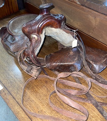 Lot 805 - A vintage leather saddle, with embossed...