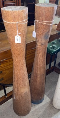 Lot 808 - A pair of carved wood candle stands, 100cm...