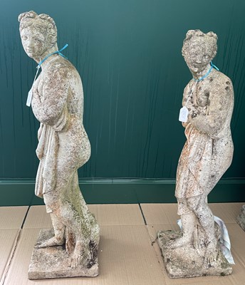 Lot 791A - A pair of composite stone garden figures...