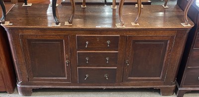 Lot 813 - An Antique oak dresser, the planked...
