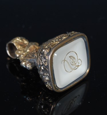 Lot 249 - A yellow metal seal fob, intaglio carved with...