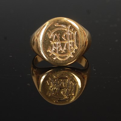 Lot 297 - An 18ct gold signet ring, size J1/2, 10 grams.