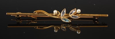 Lot 294A - A yellow metal, split pearl and gem set bar...