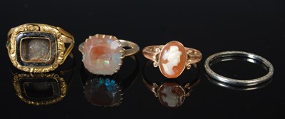 Lot 296 - A group of four assorted rings to include a...