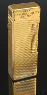 Lot 270D - A vintage Dunhill gold plated gas lighter in...