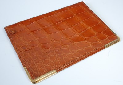 Lot 300C - A vintage 9ct gold mounted leather wallet,...