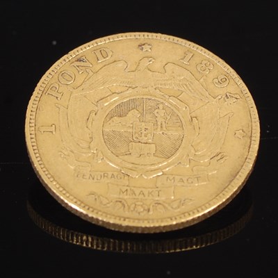 Lot 318G - An 1894 one Pond South African gold coin.
