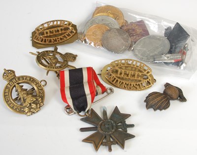 Lot 270G - A group of assorted Military cap badges; and a...