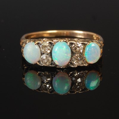 Lot 319B - A yellow metal, opal and diamond set dress...