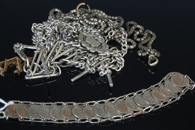 Lot 319H - A white metal coin set bracelet; assorted...