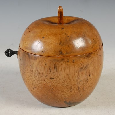 Lot 24 - A carved wooden tea caddy in the form of an...