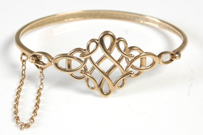 Lot 38 - A 9ct gold bangle, 13.4 grams.
