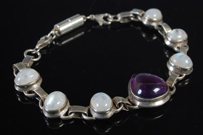 Lot 47 - An Arts & Crafts style white metal, moonstone...