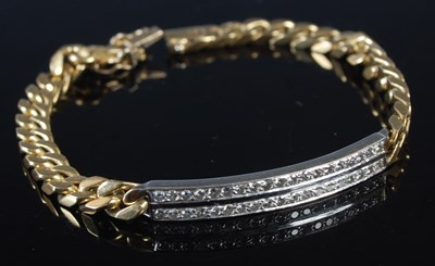 Lot 49 - A 14ct white and yellow gold bracelet with...