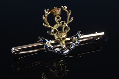 Lot 52 - A yellow metal and enamel Seaforth Highlanders...