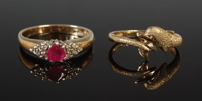 Lot 59 - A 9ct gold, ruby and diamond chip dress ring,...