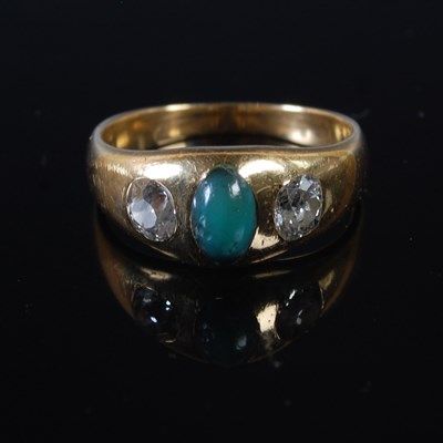 Lot 66 - A yellow metal, turquoise and diamond three...