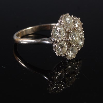 Lot 67 - A white metal and diamond cluster ring,...